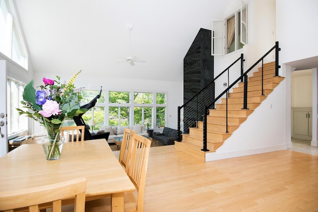 2301 State Route 129, South Bristol, ME 04568 - dining area featuring high vaulted ceiling, ceiling fan, stairway, and plenty of natural light