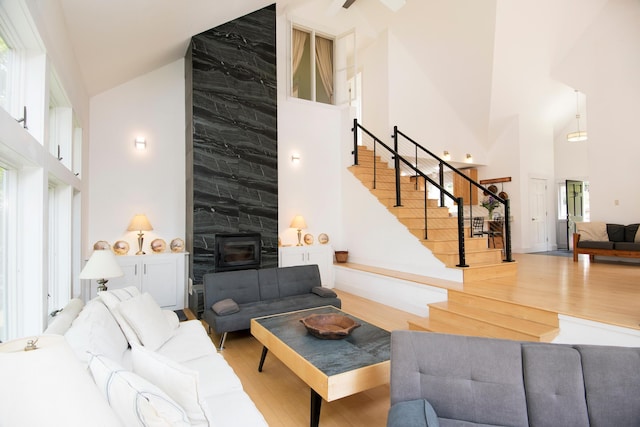 2301 State Route 129, South Bristol, ME 04568 - living area with high vaulted ceiling, wood finished floors, and stairway