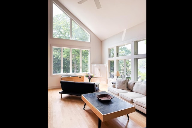 2301 State Route 129, South Bristol, ME 04568 - living area with high vaulted ceiling, a ceiling fan, and light wood-style flooring