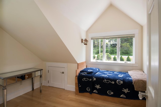 2301 State Route 129, South Bristol, ME 04568 - bedroom with lofted ceiling and wood finished floors