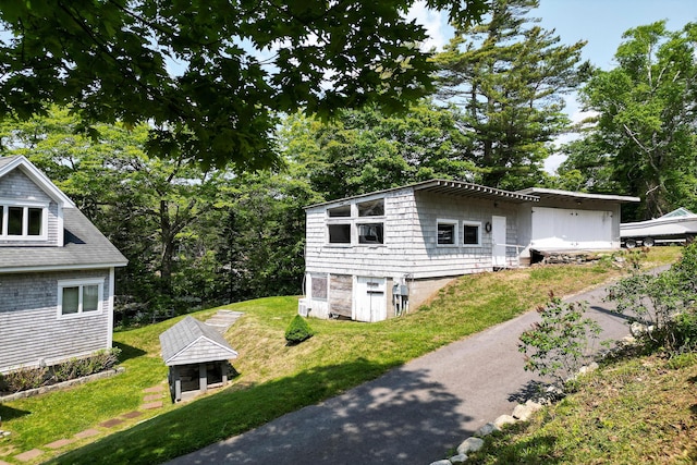 2301 State Route 129, South Bristol, ME 04568 - view of side of property with a yard and view of scattered trees
