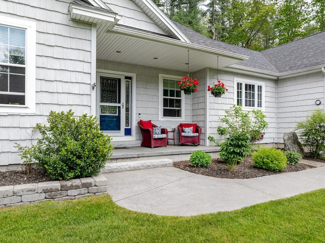 2 Neptune Rd, Old Orchard Beach, ME 04064 - property entrance with covered porch and a shingled roof
