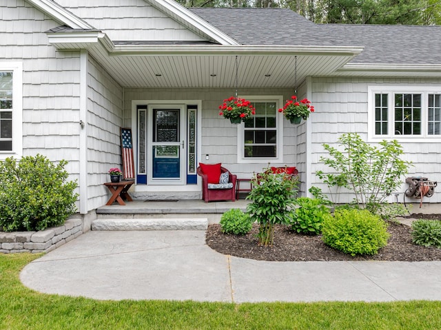 2 Neptune Rd, Old Orchard Beach, ME 04064 - entrance to property with covered porch and a shingled roof