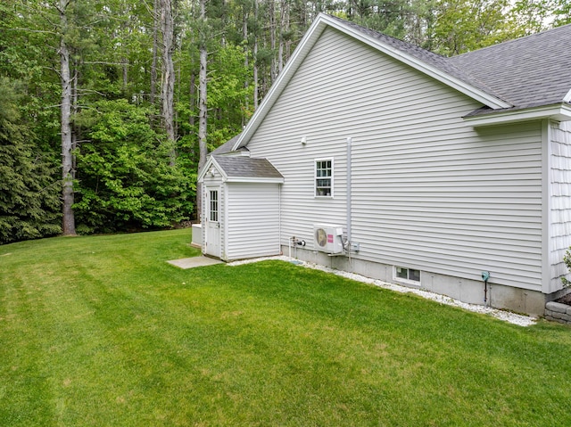 2 Neptune Rd, Old Orchard Beach, ME 04064 - view of home's exterior with a shingled roof, a cooling unit, and a lawn