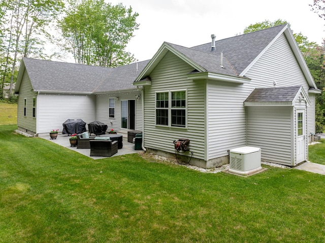 2 Neptune Rd, Old Orchard Beach, ME 04064 - rear view of house with outdoor lounge area, roof with shingles, a patio area, and a lawn