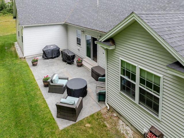 2 Neptune Rd, Old Orchard Beach, ME 04064 - rear view of property featuring a patio area, a shingled roof, a yard, and an outdoor hangout area