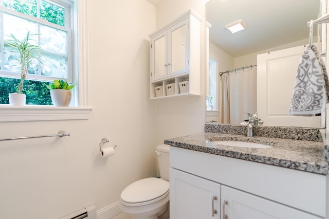2 Neptune Rd, Old Orchard Beach, ME 04064 - bathroom with toilet, vanity, and baseboards