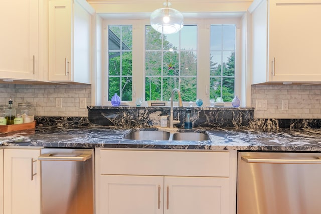 2 Neptune Rd, Old Orchard Beach, ME 04064 - kitchen with stainless steel dishwasher, a sink, white cabinets, and decorative backsplash
