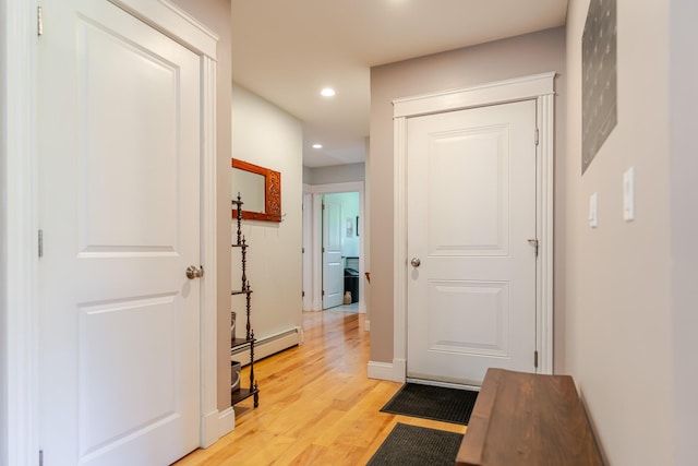 2 Neptune Rd, Old Orchard Beach, ME 04064 - hallway featuring a baseboard radiator, recessed lighting, light wood-type flooring, and baseboards