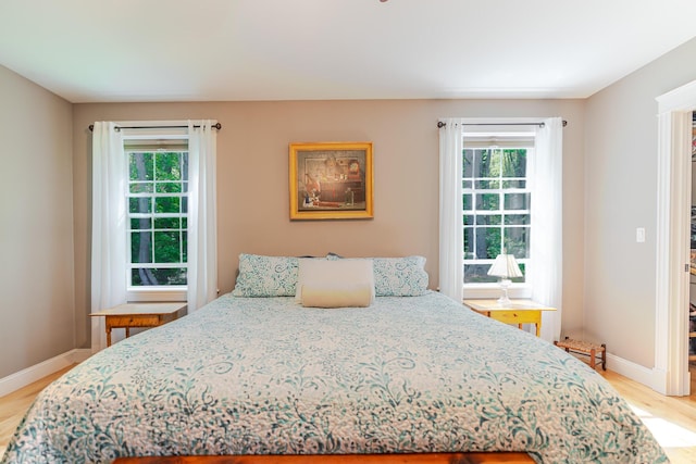 2 Neptune Rd, Old Orchard Beach, ME 04064 - bedroom with light wood finished floors and baseboards