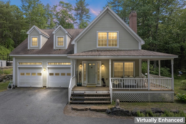 30 Oliver Woods Rd, Nobleboro, ME 04555 - view of front of home featuring asphalt driveway, a porch, an attached garage, and roof with shingles