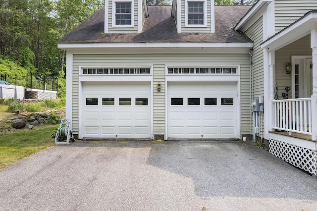30 Oliver Woods Rd, Nobleboro, ME 04555 - garage featuring asphalt driveway