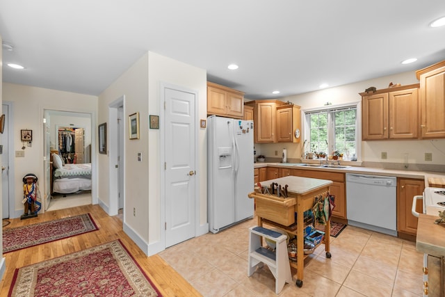 30 Oliver Woods Rd, Nobleboro, ME 04555 - kitchen with white appliances, a sink, light countertops, recessed lighting, and light wood-style flooring