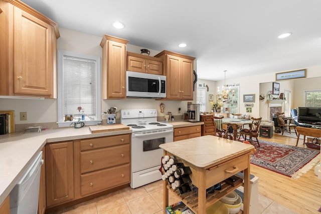 30 Oliver Woods Rd, Nobleboro, ME 04555 - kitchen featuring white appliances, light countertops, recessed lighting, a chandelier, and light brown cabinets