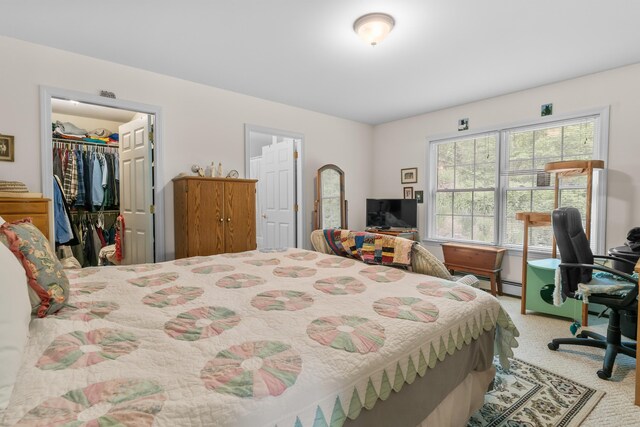 30 Oliver Woods Rd, Nobleboro, ME 04555 - bedroom with carpet flooring, a spacious closet, a closet, and an office area