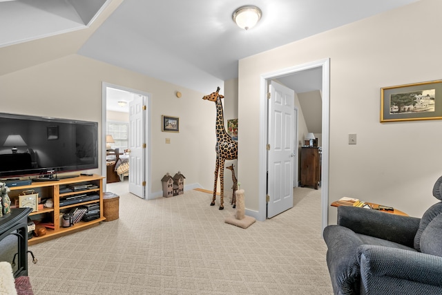 30 Oliver Woods Rd, Nobleboro, ME 04555 - living room with light colored carpet, baseboards, and vaulted ceiling