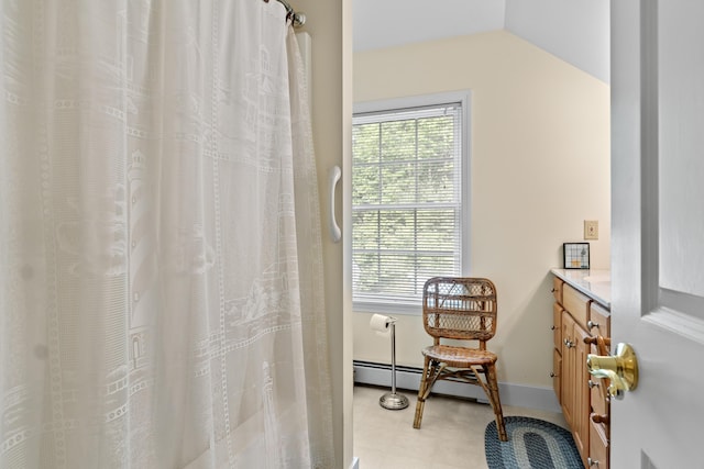 30 Oliver Woods Rd, Nobleboro, ME 04555 - bathroom featuring baseboard heating, vanity, baseboards, and curtained shower