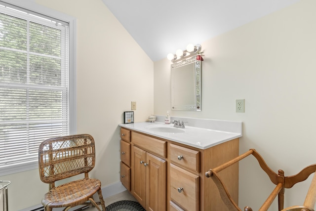 30 Oliver Woods Rd, Nobleboro, ME 04555 - bathroom with vanity, vaulted ceiling, and baseboards