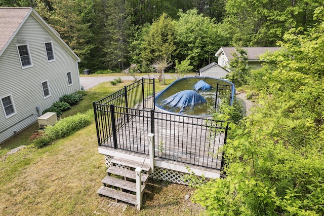 30 Oliver Woods Rd, Nobleboro, ME 04555 - view of swimming pool with a yard and a wooden deck