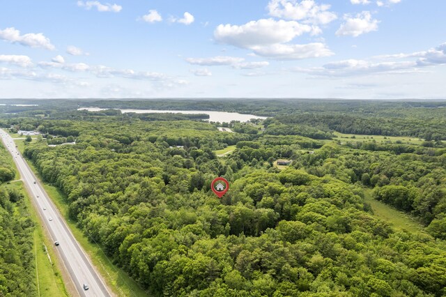 30 Oliver Woods Rd, Nobleboro, ME 04555 - bird's eye view of a forest, a nearby body of water, and a major roadway