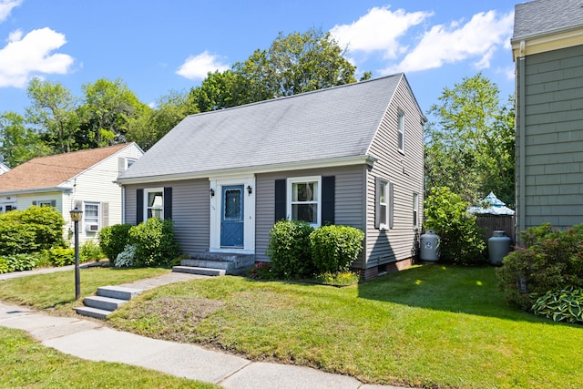 194 Margaret St, South Portland, ME 04106 - cape cod house with a front lawn