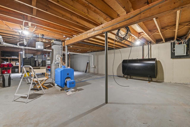 2 Laase Ave, Lewiston, ME 04240 - unfinished below grade area featuring heating fuel, a heating unit, and electric panel