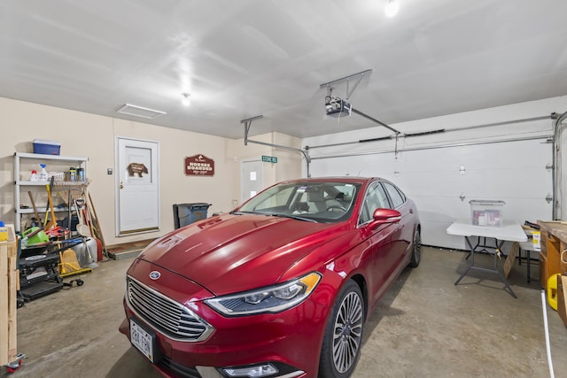 2 Laase Ave, Lewiston, ME 04240 - garage with a garage door opener