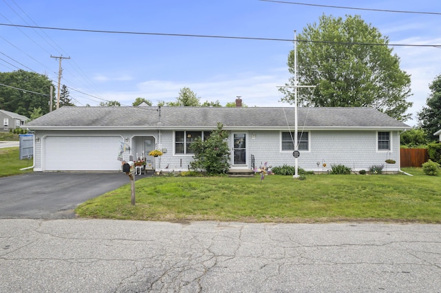 2 Laase Ave, Lewiston, ME 04240 - ranch-style house with asphalt driveway, a garage, a chimney, and roof with shingles