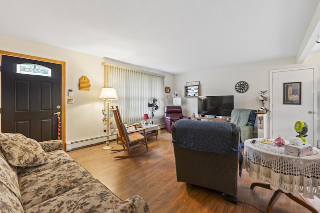 2 Laase Ave, Lewiston, ME 04240 - living room featuring wood finished floors and a baseboard radiator