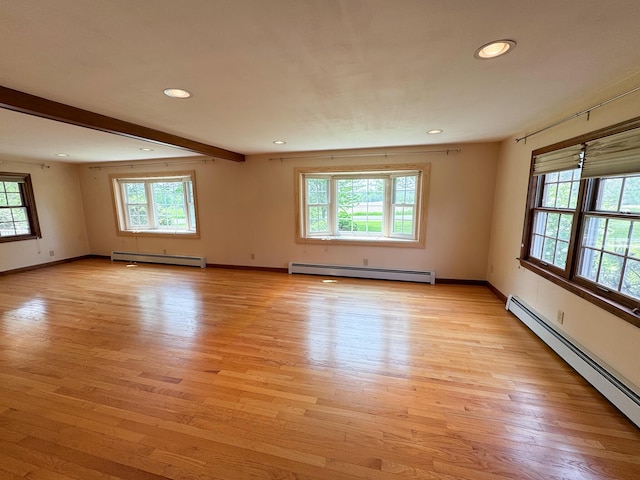 124 Swan Rd, Hermon, ME 04401 - empty room featuring a baseboard heating unit, light wood finished floors, recessed lighting, and beam ceiling