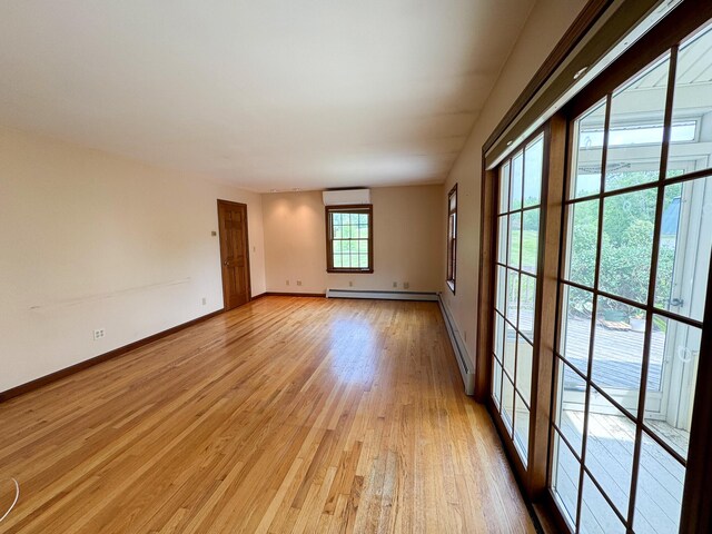 124 Swan Rd, Hermon, ME 04401 - empty room featuring light wood finished floors, baseboards, and baseboard heating