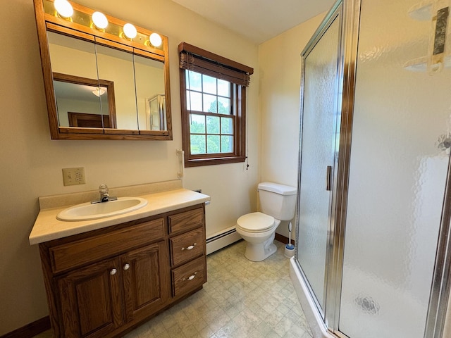 124 Swan Rd, Hermon, ME 04401 - bathroom featuring baseboard heating, vanity, tile patterned floors, a shower stall, and toilet