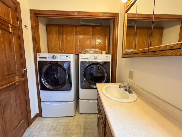 124 Swan Rd, Hermon, ME 04401 - laundry area featuring washer and dryer, light flooring, and cabinet space