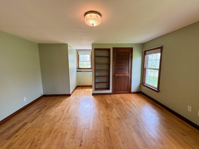 124 Swan Rd, Hermon, ME 04401 - unfurnished bedroom featuring light wood-style flooring and baseboards