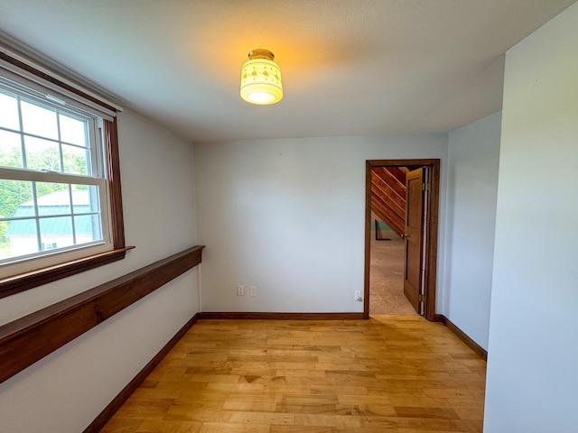 124 Swan Rd, Hermon, ME 04401 - unfurnished room featuring light wood-style flooring and baseboards