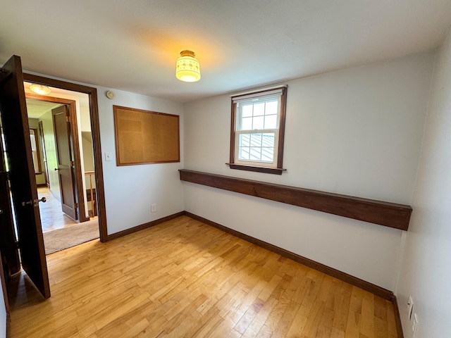 124 Swan Rd, Hermon, ME 04401 - unfurnished bedroom with light wood-type flooring and baseboards