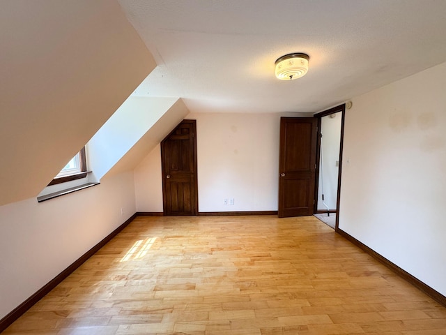 124 Swan Rd, Hermon, ME 04401 - additional living space featuring light wood finished floors and baseboards