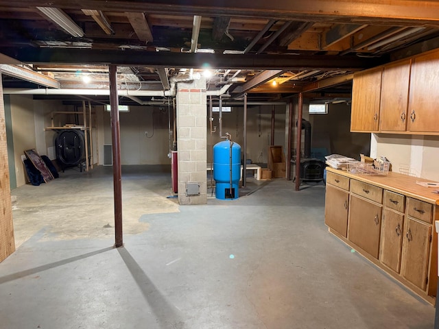124 Swan Rd, Hermon, ME 04401 - unfinished below grade area with a water pressure tank