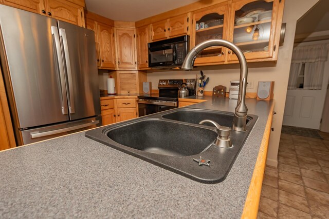 52A Judkins Rd, Harmony, ME 04942 - kitchen with black appliances, glass insert cabinets, and dark countertops