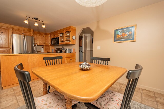 52A Judkins Rd, Harmony, ME 04942 - dining space featuring stone tile floors and baseboards