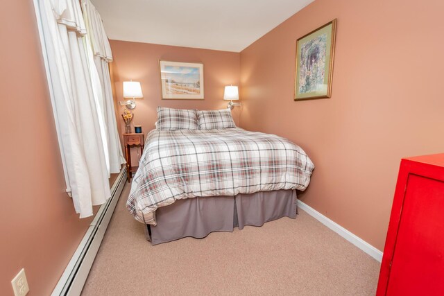 52A Judkins Rd, Harmony, ME 04942 - bedroom featuring carpet floors, baseboards, and a baseboard radiator