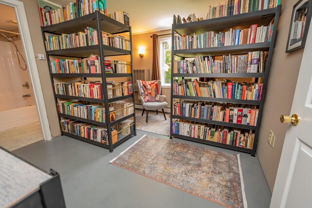 52A Judkins Rd, Harmony, ME 04942 - sitting room featuring wall of books