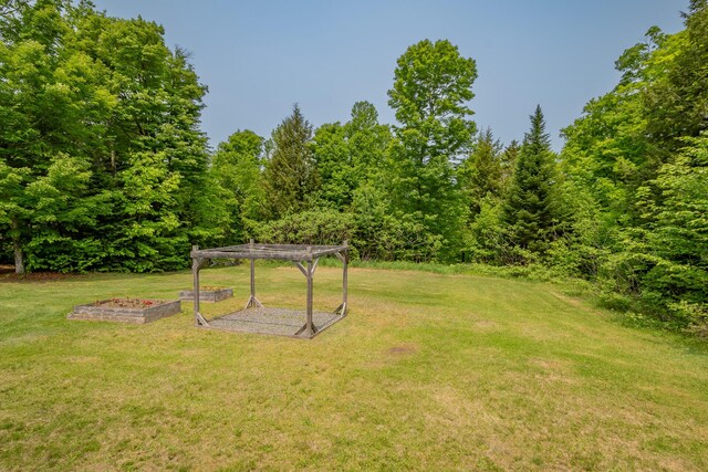 52A Judkins Rd, Harmony, ME 04942 - view of grassy yard featuring a pergola