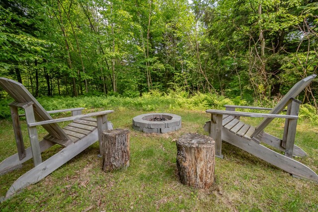52A Judkins Rd, Harmony, ME 04942 - view of yard with an outdoor fire pit