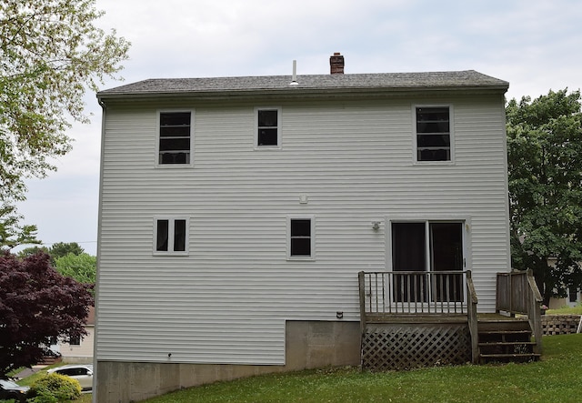 31 Curtis St, South Portland, ME 04106 - rear view of house featuring a wooden deck and a chimney