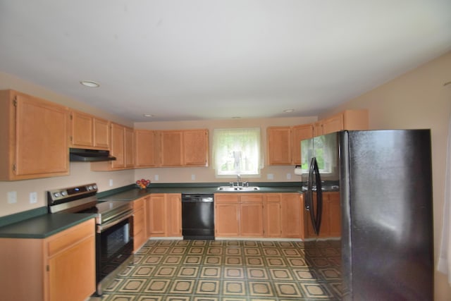 31 Curtis St, South Portland, ME 04106 - kitchen featuring black appliances, under cabinet range hood, dark countertops, recessed lighting, and light flooring