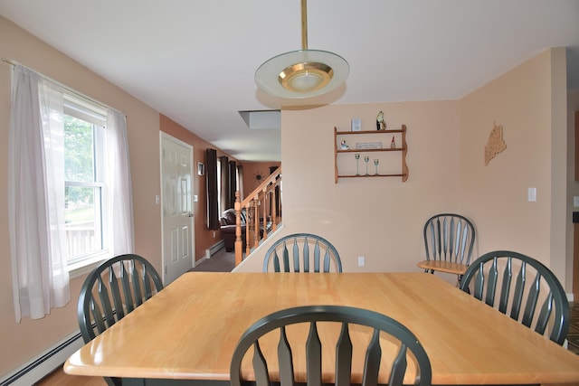 31 Curtis St, South Portland, ME 04106 - dining room featuring stairway and a baseboard radiator