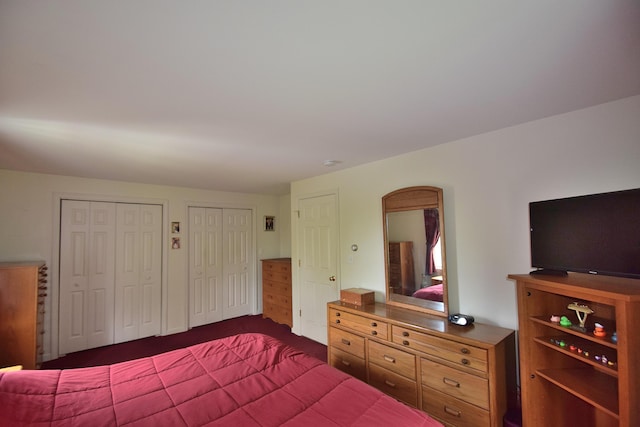 31 Curtis St, South Portland, ME 04106 - bedroom with multiple closets and dark carpet