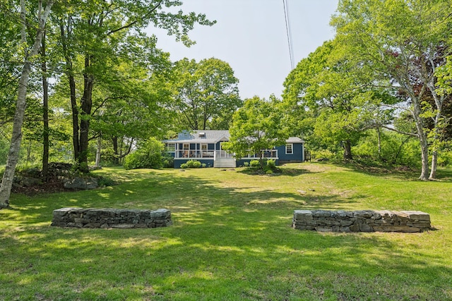 74 Ottawa Ave, Portland, ME 04109 - view of grassy yard featuring an outdoor structure and a deck