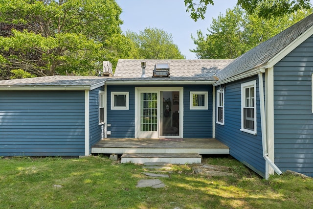 74 Ottawa Ave, Portland, ME 04109 - rear view of house featuring a yard, a wooden deck, and roof with shingles